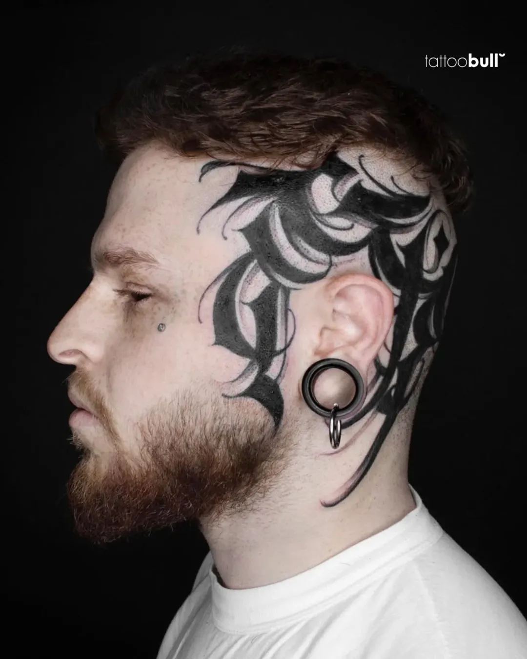 around the ear tattoo